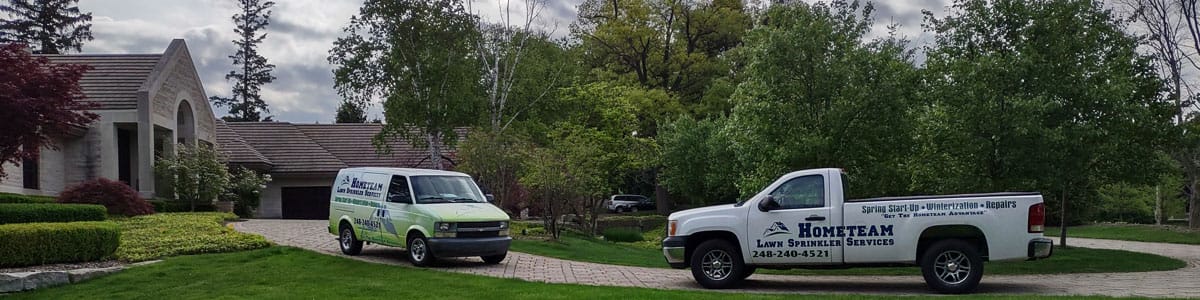 HomeTeam Lawn Sprinkler Services Trucks